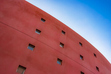 Geometric shapes of modern building facades with blue sky spaces