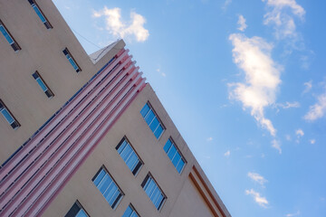 Geometric shapes of modern building facades with blue sky spaces