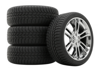 A stack of new car tires with chrome rims is ready for installation, isolated on transparent background