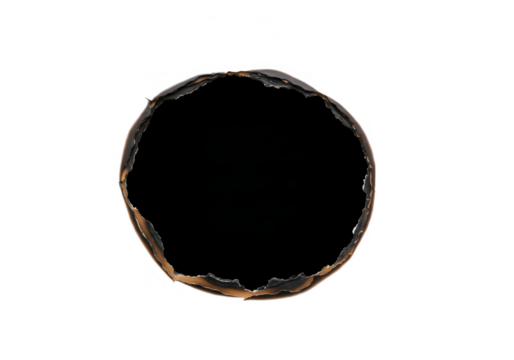 A dark, burnt hole with rough edges is isolated on transparent background, creating a dramatic and textured effect
