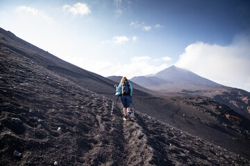 hiker trekking on mount Etna