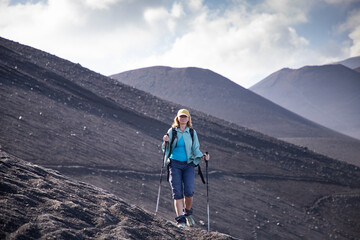 hiker trekking on mount Etna