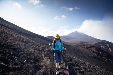 hiker trekking on mount Etna