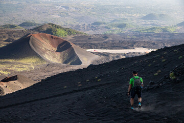 hiker trekking on mount Etna