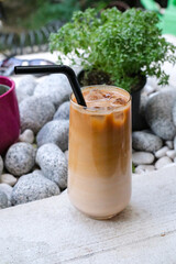 Perfectly layered iced latte with smooth milk and bold espresso. A calm, stylish refreshment.