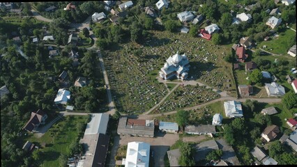 Aerial view of the church and graveyard in the village.