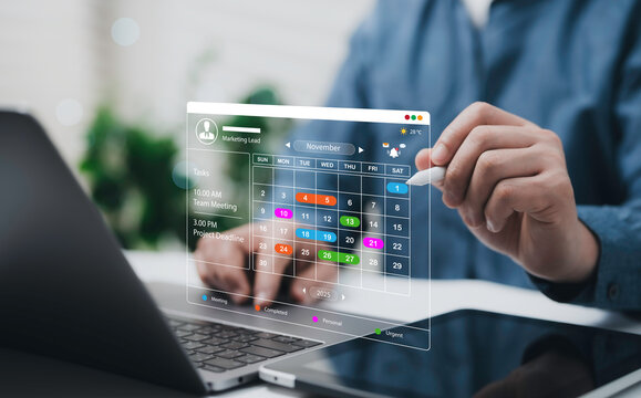 Businessman using stylus to plan schedule with digital calendar interface showing meetings project deadlines time management task list smart planning productivity workflow optimization