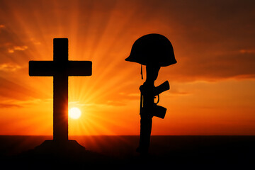 Memorial day sunset with cross and soldier helmet rifle silhouette image