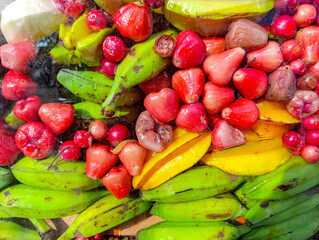 Fresh Fruit Variety Displayed Together Including Bananas, Star Fruit and Rose Apples