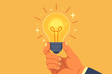 Businessman hand holding a shining light bulb. Creative idea, innovation, and inspiration concept. Metaphor for problem solving, thinking, and brilliant business solutions.