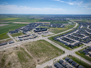 View of a residential area with a lot of houses and a few empty lots © Scott Prokop