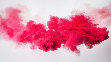 A festive explosion of red powder in mid-air against a clean white background.
