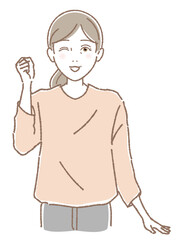 拳をあげて応援する中高年女性