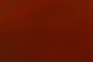 Warm rich brown dark background or deep texture suitable for abstract design and autumn concepts