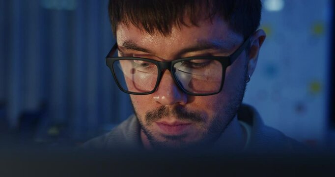 Closeup team adult male freelance work late typing write prompt AI bot app program nomad terminal code at office night. Artificial intelligence dashboard, robotics, user interface, machine learning.