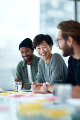 Fototapeta premium Diverse team collaborating, smiling, positive energy. Meeting or workshop. Represents teamwork, success, and innovation. Good for corporate communication.