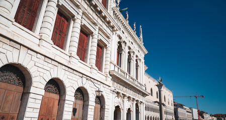 Beautiful architecture along the waterfront in Venice on a clear sunny day