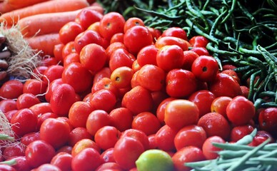 Fresh Tomatoes and Vegetables at Market