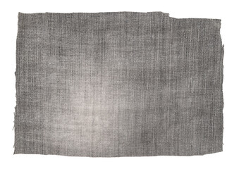 Piece of black torn denim on a white background. Denim texture