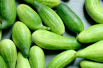 Fresh Green Cucumbers Displayed on Surface Ready for Use