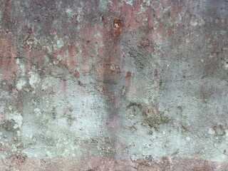Aged Concrete Surface with Rustic Green Red Patina