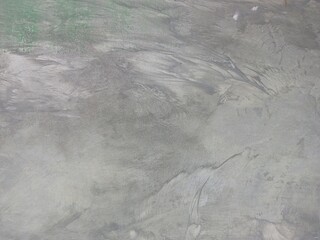 Rough Concrete Wall with Green and Gray Tones