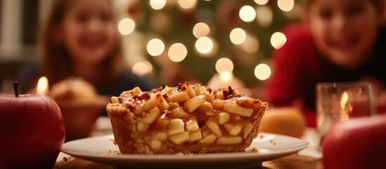 Festive apple pie dessert with family at christmas celebration dinner