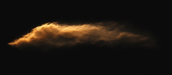Golden cloud illuminates the night sky, creating an atmospheric and captivating spectacle