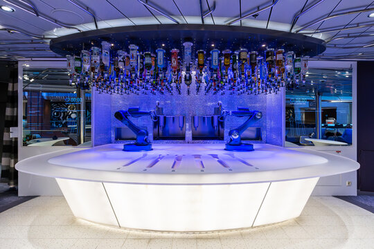 Seattle, WA, USA - May 31, 2025: The Bionic Bar is on various Royal Caribbean cruise ships where two robotic bartenders make various drinks. 
