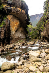 The Tugela River flowing through its narrow, boulder strewn gorge in the Drakensberg mountains in South Africa.