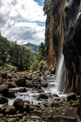 Side view of a small temporary waterfall, falling into the Tugela Gorge, in the Drakensberg Mountains of South Africa.