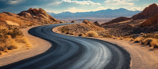 Winding road through desert mountains