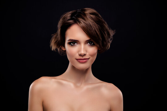 Photo of gorgeous young model brown bob haired lady undressed model free shoulders isolated on black color background