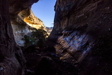 Looking out through the entrance of the narrow eco Ravine, in the Golden Gate Highlands National Park of South Africa.