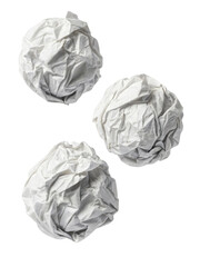 Fototapeta premium Crumpled paper balls scattered on transparency background create sense of disarray and creativity