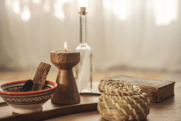 Burning Palo Santo and Candle on Wooden Tray for Relaxation and Meditation