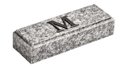 A granite desktop nameplate with engraved initials, white background --ar 16:9