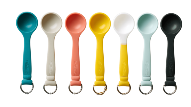 A tapered silicone measuring spoons in keyring, white background --ar 16:9