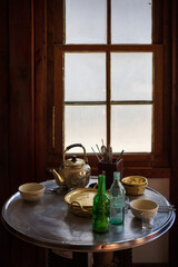 Makgeolli drink with Korean traditional food Pajeon on table Local Restaurant Korea travel