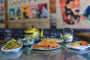 Makgeolli drink with Korean traditional food Pajeon on table Local Restaurant Korea travel