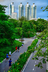 High angle view of the jogging paths in Benjakitti Park at evening, Bangkok, Thailand.	
