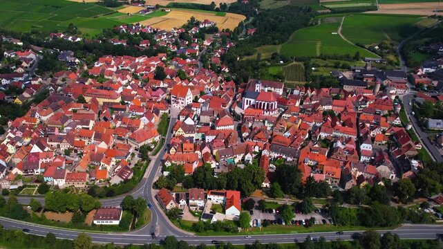 A panorama Aerial view around the old town of the city Dettelbach on an early summer day in Germany.	