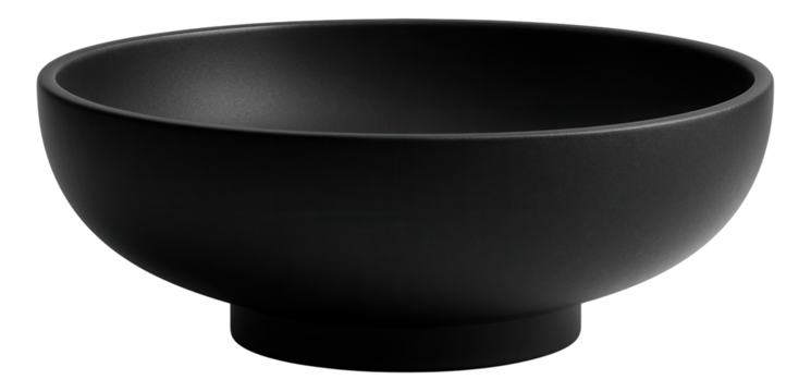 A bold, matte black stone basin that provides a contemporary touch for a modern home.