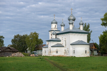 The Church of the Nativity of the Virgin Mary (1680) in the cityscape on a cloudy August morning. Kargopol, Russia