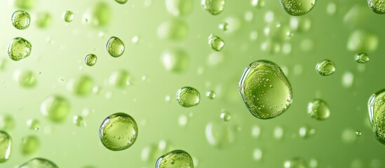 Green liquid droplets, close-up