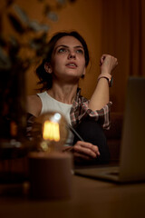 beautiful graphic designer woman working at home office remotely using digital graphic tablet and...
