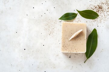 Natural handmade soap bar with green leaves and exfoliating ingredients