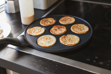 Cooking Pancakes on Modern Stove