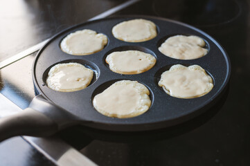 Cooking Pancakes on Modern Stove