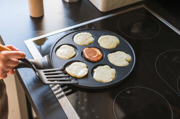Cooking Pancakes on Modern Stove